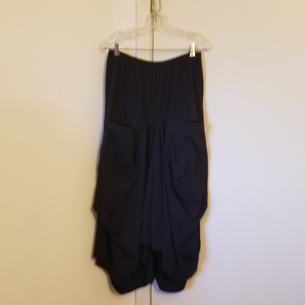 Completo Collection long avant garde jersey skirt, unique structure with pockets